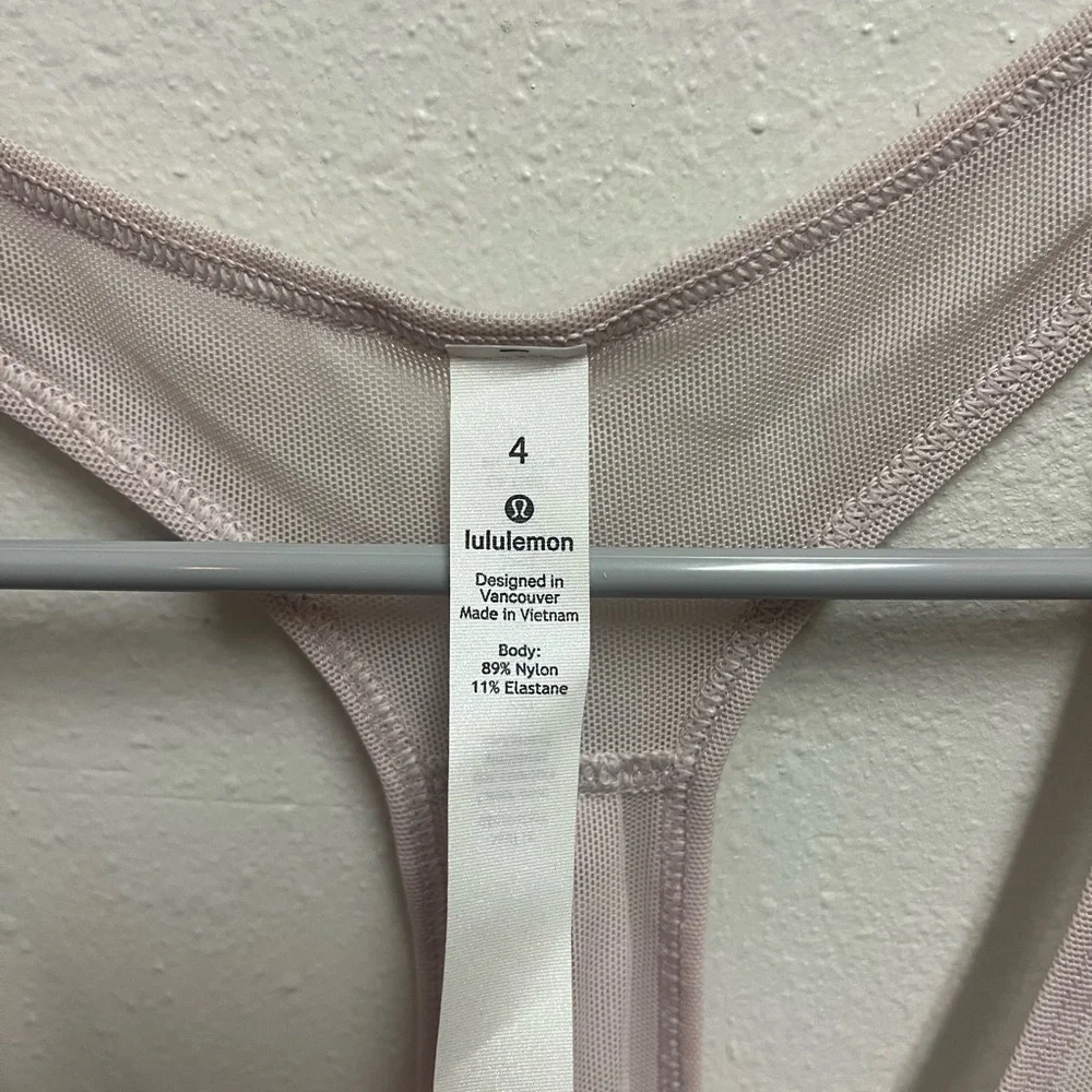 Lululemon pink mesh workout top. Never been worn. - Picture 2 of 5